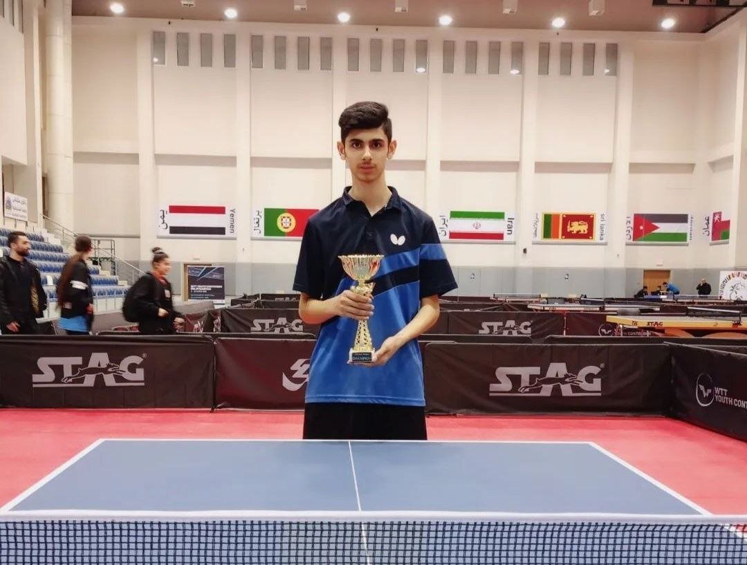 عکس قهرمان تنیس روی میز - دانستنی ها عکس قهرمان تنیس روی میز